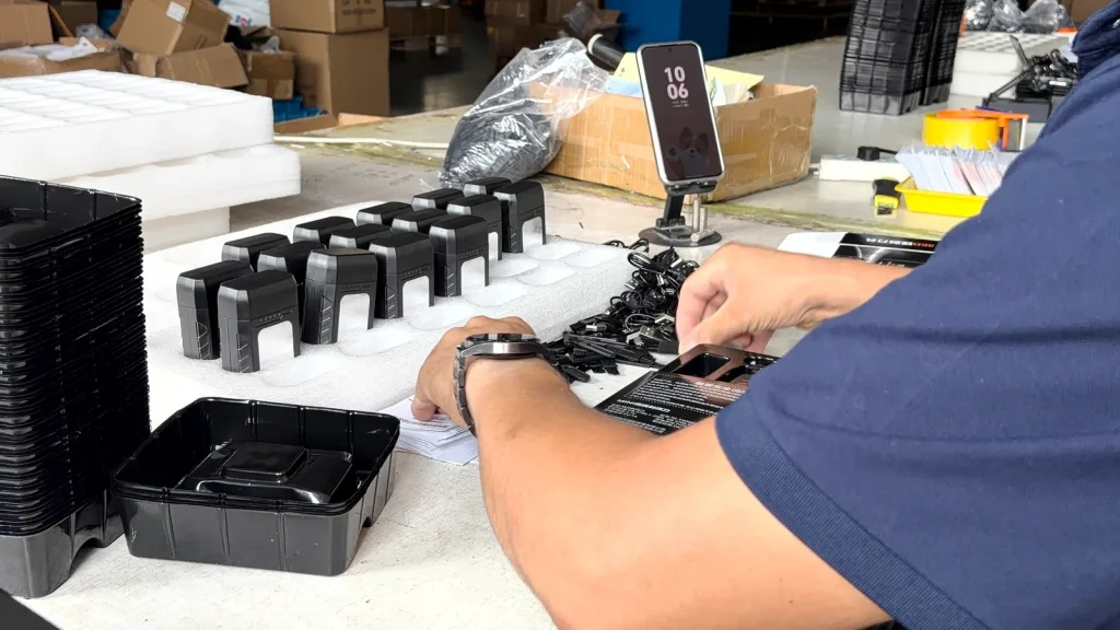 Shaving units being prepared at a packing workbench