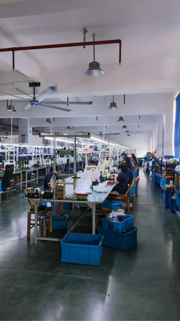 Appliance production line with component handling stations